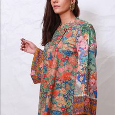 Such Pretty And Vibrant Colors! Would Look Cute With White Pants Or Jeans! Multicolor Printed Blouse For Spring, Spring Multicolor Tops With Printed Motifs, Red Long Sleeve Tops With Printed Motifs, Casual Floral Print Festive Blouse, Casual Festive Floral Print Blouse, Red Long Sleeve Blouse With Printed Motifs, Short Tunic, White Pants, Tunics