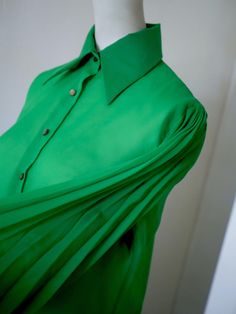 Authentic 70s blouse in semi-transparent (soft) polyester voile in a deep green. Featuring very beautiful pleated lantern sleeves (good fit) with high three-button cuffs (all original). In good condition. Green Fitted Top With Gathered Sleeves, Elegant Green Top With Gathered Sleeves, Fitted Green Blouse With Gathered Sleeves, Green Office Blouse With Button Cuffs, Green Blouse With Balloon Sleeves, Green Blouse With Button Cuffs For Office, Green Fitted Blouse With Balloon Sleeves, Green Pleated Sleeves Blouse For Spring, Classic Green Office Blouse