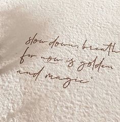 the writing is written in brown ink on white paper with an old - fashioned pen