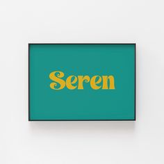 there is a green and yellow sign on the wall that says seren in gold