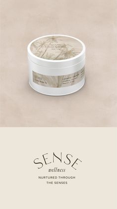 a white jar with the words sense written on it and an image of a plant