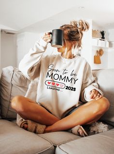 Soon To Be Mommy 2025 Loading Sweatshirt, Mommy Pregnancy Shirt, Mother's Day Shirt, New Parents Shirt, Pregnancy Announcement Shirt, S445 🛍️👚🎉 WELCOME TO CUSTOM STYLE TEE! ️ Looking for high-quality, comfy shirts you can customize for special occasions or loved ones? You're in the right place! At Custom Style Tee, we're passionate about our craft and dedicated to providing a great shopping experience. Got any questions about our products? Don't hesitate to reach out--we'll get back to you qu New Mom Shirt Ideas, Single Mom Pregnancy Announcement Photos, Single Mom Pregnancy Announcement, 2025 Loading, Pregancy Announcement, Cricut Clothes, Surprise Pregnancy Announcement, Pregnant Shirt, Momma Shirts