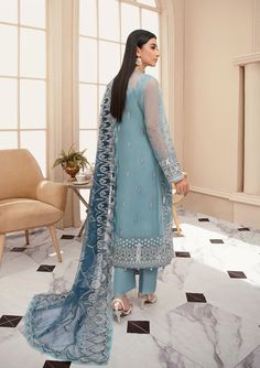 Sky Blue Embroidered Capri Style Pakistani Salwar Kameez Dupatta is Beautiful outfit with a combination of floral embroidered borders and a heavenly embellished neckline. Delicate lace trims all over the sleeves and dupatta make the outfit simply unique with just the right amount of sparkle. Kameez Salwar: This kameez is adorned with sophisticated floral embroidery on the daman and has alluring work on the neckline it features fine sequins, crystals, and pearls making a stunning elegant composit Fashion Newsletter, Chiffon Sleeves, Organza Sleeves, Pakistani Salwar Kameez, Unique Outfit, Chiffon Collection, Embroidered Chiffon, Embroidered Sleeves, Embroidered Organza