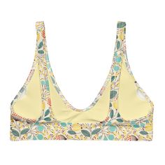 By the Sea Floral print bralette bikini top is your go-to for everything under the sun and saltwater. Featuring warm retro color tones and whimsical flowers, this women's swimsuit top is made with recycled fabric and crafted with light support. Features a deep v-neck. • Fabric: 81% Recycled Polyester, 19% Lycra • Fabric weight 7.52 oz • Double-layered and non-reversible • Removable padding • Tear-away care label • Zig-zag stitching Retro Color, Swimsuit Tops, Recycled Fabric, Swimwear Tops, Colour Tone, Women Swimsuits, Bralette, Fabric Weights, Floral Prints