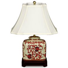 a lamp with a red and white design on it