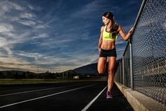 a woman leaning against a fence with the words workout motivation tip put you exercise clothes on and then decide if you are going to work out or not