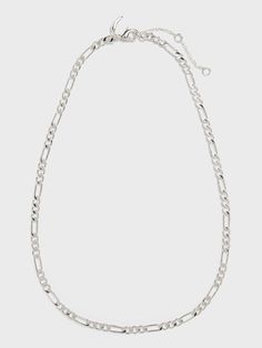 Dress it up or dress it down, our jewelry collection is filled with pieces that add instant polish.  Lobster clasp.  Length: 16" (40. 6cm) with 2" extender. Trendy Silver Jewelry With Figaro Chain, Silver Figaro Chain Choker Necklace, Silver Figaro Chain Necklace Choker, Silver Clavicle Chain Jewelry With Oval Link, Silver Metal Jewelry With Figaro Chain, Trendy Silver Figaro Chain Necklace, Silver Figaro Chain For Jewelry Making, Figaro Chain Necklace, Necklace Dress