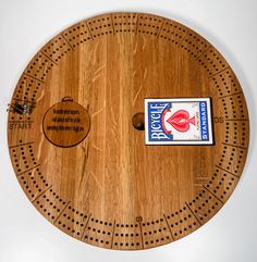 a wooden cutting board with a sticker on it