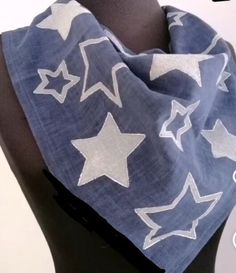 a blue scarf with white stars on it