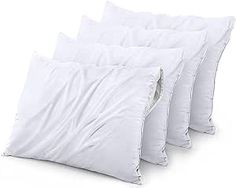 four pillows stacked on top of each other