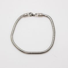 Classic snake chain bracelet High polished stainless steel 3mm width Metal Snake Chain Bracelet With Lobster Clasp, Modern Metal Bracelets With Snake Chain, Minimalist Metal Snake Chain Bracelet, Minimalist Snake Chain Bracelet With Lobster Clasp, Metal Charm Bracelet With Snake Chain And Lobster Clasp, Metal Charm Bracelet With Lobster Clasp And Snake Chain, Silver Metal Snake Chain Charm Bracelet, Silver Adjustable Chain Bracelet, Mens Chain Bracelet