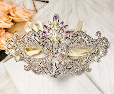 FAST & FREE SHIPPING DURABLE QUALITY: This Crystal Masquerade Mask is made of high-quality alloy and rhinestone diamond. They are manual workmanship, very comfortable to wear. ELEGANT DESIGN: The masquerade mask is encrusted shinny diamond rhinestone and crystal. The intricate and delicate are very glamorous, elegant and luxury. PRINCESS STYLE: You will be the center of attraction at party when you wear the princess style fancy mask. VARIOUS OCCASION: The masks are perfect for Masquerade party, Roman Mask, Couples Masquerade Masks, Mardi Gras Wedding, Masks Halloween, Masquerade Wedding, Silver Mask, Carnival Themed Party, Happy Jewelry, Masquerade Masks