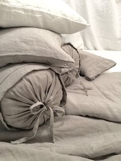 several pillows stacked on top of each other