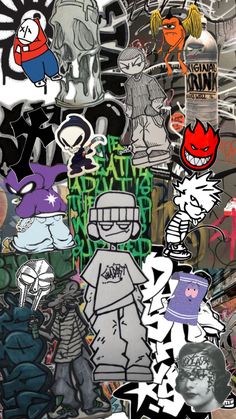 a bunch of stickers on the side of a wall that is covered in graffiti