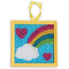 an ornament with hearts and a rainbow