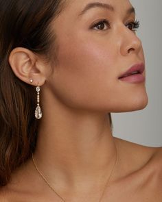 18K Yellow Gold Signature Set White Topaz Pear Shape, Pearl and Diamond Drop Earring, .12 TCW1 3/4 Inch Long x 3/8 Inch Wide Style# YESSWTP3W Gold Diamond Drop Earrings, Diamond Drop Earrings, Diamond Drops, Pearl Diamond, White Topaz, Pear Shaped, Pearl White, Topaz, Gold Earrings