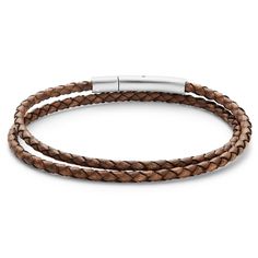 Wear it wrapped twice around your wrist or once around your neck as a subtle choker. When it comes to versatility, nothing beats simplicity. This bolo weave men’s bracelet is the perfect understated highlight, an element in a stack of bracelets, or a companion to a watch. Its neutral brown makes it ideal for layering in a row of necklaces of any colour. The leather is directly attached to the surgical-grade stainless steel push-button clasp with a steel pin, providing unequalled strength and dur Minimalist Braided Bracelet For Everyday Use, Modern Braided Jewelry For Everyday, Modern Adjustable Brown Wrap Bracelet, Minimalist Adjustable Braided Bracelet With Stainless Steel Clasp, Masculine Everyday Jewelry With Leather Strap, Modern Brown Adjustable Wrap Bracelet, Luxury Brown Leather Bracelet With Palladium Hardware, Elegant Brown Leather Bracelet With Stainless Steel Clasp, Masculine Brown Leather Bracelet For Everyday