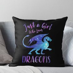 a black pillow with the words, just a girl who loves dragon's on it