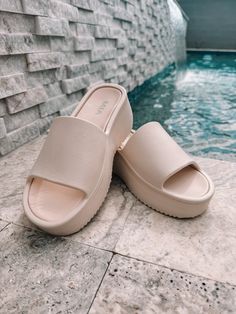 EVA platform slide with cushion. Rounded square toe and slight wedge. fits true to size Rounded Square, Platform Slides, Platform Sandals, Wedges, Sandals, Square, Black