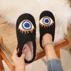 Women's Size 7.5/8 Winter Evil Eye Indoor Slippers New With Tags Black Flat Slippers With Textured Footbed, Black Slippers With Textured Footbed And Round Toe, Black Slippers With Textured Footbed And Flat Heel, Black Casual Slip-on Slippers, Black Flat Heel Slippers For Spring, Casual Black Slip-on Slippers, Black Synthetic Slip-on Slippers, Black Slip-on Slippers For Spring, Black Non-slip Slippers With Round Toe