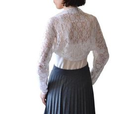 "This beautiful light Bridal lace shrug bolero with Long sleeves is * READY TO SHIP IN  white color size XS, S, M * Model on the pic have M size * Size Sleeve length 22\"-52 cm Back length-10\"-26cm *XS EU 36 US 6-8 *S EU 38 US 8-10 *M EU 40 US 12-14 * Fabric This shrug is made of quality cotton lace (cotton 20%, viscoze 75%. elastan 5 %).  * Design & Style Details The shrug is perfect for for special evening or wedding ceremony It cover your shoulders in wright way. The shrug is soft, perfect f Fitted Shrug With Lace Sleeves For Spring, Fitted Lace Shrug With Lace Trim, Long Sleeve Lace Shrug For Wedding, Long Sleeve Lace Wedding Shrug, Lace Long Sleeve Wedding Shrug, It Cover, Sleeve Bolero, Lace Shrug, Wedding Shrug