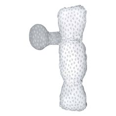 a white teddy bear with polka dots on it's back and the top part of its body