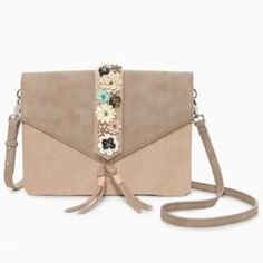 Complete Any Spring “Look” With This Adorable Stella & Dot Flourette Crossbody In Its Original Packaging. 3 Ways To Attach Embroidered Floral Strip For 3 Different “Looks”, Or Use Without Detachable Strip Altogether For A Different Look. See Pictures. Floral Interior Lining. Tassel. Tan/Beige Vegan Leather. 10 In X 7 In, 48 In Strap. Nwt Mushroom Vegan, Floral Interior, Spring Looks, Stella And Dot, Bago, Leather Purses, Vegan Leather, Bags Handbags, Tassels