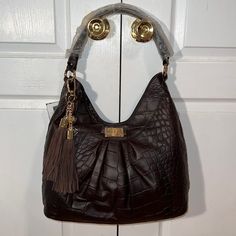 Brand New With Tags 100% Authentic Just Cavalli Hobo Bag With Beautiful Bow And “I” “” “U” Key Chain Attached Perfect Christmas Gift Designer Hobo Bag With Double Handle For Errands, Designer Double Handle Hobo Bag For Errands, Designer Top Handle Hobo Bag For Errands, Luxury Double Handle Hobo Bag For Errands, Luxury Rectangular Hobo Bag For Shopping, Luxury Top Handle Hobo Bag For Errands, Brown Tote Bag For Everyday Luxury, Brown Shoulder Bag For Everyday Luxury, Brown Everyday Luxury Shoulder Bag