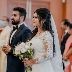 the bride and groom are waiting to be married