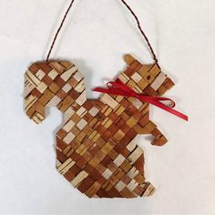 a wooden ornament shaped like a bear