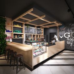 the interior of a coffee shop with chalk writing on the wall