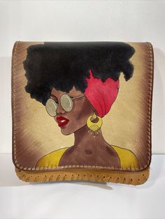 Chicatolia Genuine Leather Painted Handmade Ladies Women's Crossbody Bag Size 7" x 7.25" x 2.5" Condition: Brand new. Ships FAST! Features: Hand-Painted Handmade Design Size : 7" H x 7-1/4" W x 2-1/2"D | 13.5 oz Premium quality, durable, byproduct, cowhide leather Vegetable-tanned, organic root dyed 1 inside compartment, 1 pocket inside, 1 smaller pocket in the front Secured by two snap buttons, adjustable strap 100% handmade and hand painted Leather Paint, Womens Crossbody Bag, Handmade Design, 7 H, Cowhide Leather, Canvas Tote, Hand Embroidered, Hand Embroidery, Bags Handbags