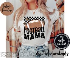 a woman wearing a football shirt with the words football mama on it