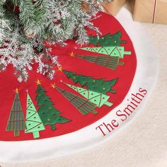 a christmas tree skirt is sitting on the floor