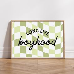 a green and white poster with the words long live boyhood in black on it