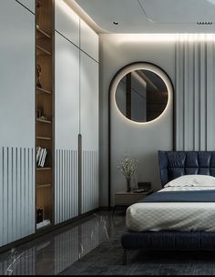 a bedroom with a large bed and round mirror on the wall