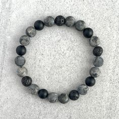 Men's beaded bracelet includes: ~ 8mm or 10mm Matte Black Labradorite beads ~ 8mm or 10mm Matte Onyx beads ~ 8mm or 10mm Black Lava beads ~ Stretchy cord; simply slide bracelet on and off wrist ~ Comes packaged in a re-usable microfiber pouch To ensure the perfect fit, please use the bracelet sizing instructions found in the photo gallery. Men Beaded Bracelet Ideas, Boy Bracelets, Male Bracelets, Boys Bracelet, Beads Bracelet For Men, Beaded Bracelets For Men, Beaded Bracelet For Men, Mcu Dr, Mens Bracelet Black