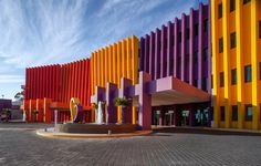 the colorful building has many different colors on it