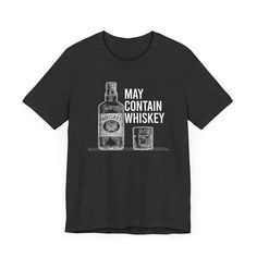 a black t - shirt that says may contain whiskey on the front, and an image of