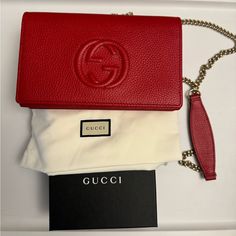 A Chic And Adorable Addition To Gucci's 'Soho' Collection. The Soho Wallet On Chain Is Rendered In A Beautiful Deep Shade Of Red And Finished With Gold-Tone Hardware And Gucci's Iconic Interlocking Soho 'Gg' Logo Embroidered On The Front Of The Wallet. Wear The Wallet Over Your Shoulder With The Chain Link Strap And Remove It And Carry It As A Wallet. Includes Gucci Dust Bag And Gucci Box Condition: New, Never Used; Made In Italy Material: Pebbled Calfskin Leather Details: Exterior Gold Snap Clo Gucci Leather Wallet On Chain, Gucci Leather Wallet On Chain For Everyday Use, Gucci Leather Wallet On Chain For Formal Use, Gucci Leather Wallet On Chain For Formal Occasions, Designer Gucci Leather Wallet On Chain, Classic Gucci Leather Wallet On Chain, Elegant Gucci Wallet On Chain As Gift, Gucci Leather Wallet On Chain With Gold-tone Hardware, Red Gucci Bag With Chain Strap