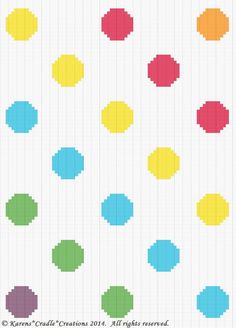 a cross stitch pattern with different colored dots on white paper and text that says,