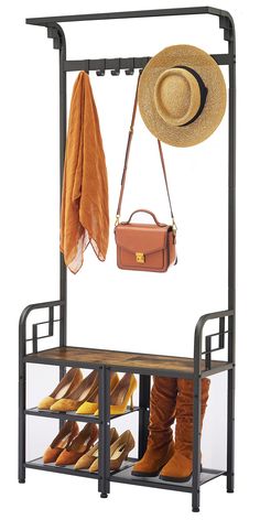 a coat rack with boots, umbrellas and handbags