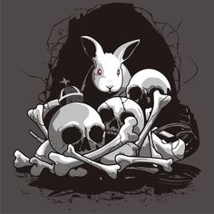 a rabbit sitting on top of a pile of skulls