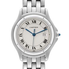 Cartier Cougar Silver Dial Steel Mens Watch 987904. Quartz movement. Stainless steel round case 32 mm in diameter. Octagonal crown set with the blue spinel cabachon. Smooth stainless steel bezel. Scratch resistant sapphire crystal. Silvered dial with roman numerals. Sword shaped blue steel hands. Date window at 3. Stainless steel bracelet with hidden deployment clasp. Will fit up to 6.5" wrist. Classic Cartier Watch With Metal Dial, Classic Cartier Watch, Classic Cartier Watch Accessories With Date Indicator, Classic Analog Round Watch Accessories, Classic Analog Round Watches, White Gold Analog Watch Accessories, Classic Round Chronometer Watch Accessories, Classic Round Jewelry And Watches For Formal Occasions, Classic Round Watches With Polished Finish