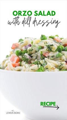 a white bowl filled with pasta and vegetables