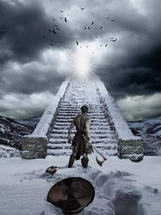 a man standing in the snow next to a stairway