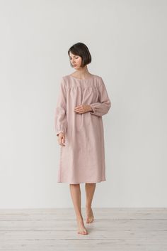 "MONA gather dress made from soft linen in dusty pink. - length is ± 107 cm (42\") (depends on size) - gathered front, back and sleeves - loose fit - without pockets DETAILS: - 100 % European, pre-washed medium weight linen (205 g/m²) - the model is 176 cm (5′9″) high, wearing size S. - model measurements: bust 83 cm (33\") / waist 61 cm (24\") / hips 90 cm (36\") - color in the picture - dusty pink (you can choose other color on the right) MADE TO ORDER: All pieces are made to order, it will ta Pink Long Sleeve Nightgown For Nighttime, Feminine Long Sleeve Sleep Dress, Pink Long Sleeve Nightgown, Pink Long Sleeve Dresses For Night, Feminine Long Sleeve Dress For Sleepover, Feminine Long Sleeve Loungewear Dresses, Feminine Long Sleeve Dresses For Loungewear, Pink Midi Dress With Gathered Sleeves For Daywear, Gather Dress