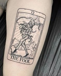 the fool tarot card tattoo on the right arm and shoulder, with an image of a