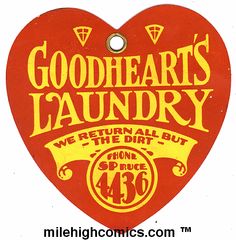 a red heart shaped sign with the words good hearts laundry