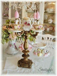 there is a fancy tea set on the table